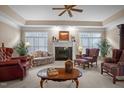 Spacious living room with fireplace and comfortable seating at 7220 Dime Dr, Raleigh, NC 27606