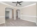 Dining room with crown molding, fresh paint, and LVP flooring at 2200 Becketts Ridge Dr, Hillsborough, NC 27278