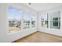 Bright room with large windows offering community view with swimming pool at 506 Billingshurst Way, Knightdale, NC 27545