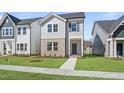 Charming two-story home with a landscaped yard and covered front entrance at 733 Portland Rose Dr, Knightdale, NC 27545