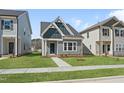 Beautiful home exterior with a well-kept lawn at 737 Portland Rose Dr, Knightdale, NC 27545