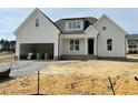 Spacious two-story home with an attached garage and ample yard space at 2316 Eagle Shot Ct # 21, Fuquay Varina, NC 27526