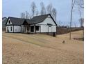 Lovely single-Gathering home with a unique exterior and well-kept landscape at 2829 Faucette Ln, Burlington, NC 27217