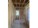 Stairway being constructed with exposed beams and new door at 3325 Colby Chase Dr # 9, Apex, NC 27539