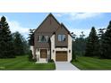 Elegant new home with classic brick facade, gable roof, wood accents, and a well-manicured lawn at 627 Georgetown Rd, Raleigh, NC 27608