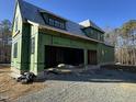 New house under construction, showing the exterior framing at 65 Firefly Overlook, Pittsboro, NC 27312