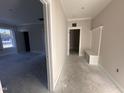 A light and bright hallway with built-in bench seating at 614 Tuscany Cir, Princeton, NC 27569