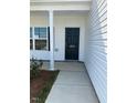 Close up of front door with number 253 and white columns at 253 Plains Dr # 264, Burlington, NC 27217