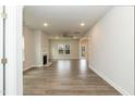 Spacious living room with a fireplace, recessed lighting, and a ceiling fan at 225 Hopewell Branch Ct, Smithfield, NC 27577