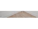 Light brown wood-look tile flooring at 1429 Patchings Ln, Knightdale, NC 27545