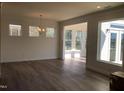 Bright dining room with hardwood floors and access to sunroom at 508 Glenwyck Ct, Fuquay Varina, NC 27526