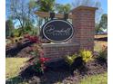Broadwell Estates community entrance sign surrounded by a stone and brick pillar, with roses at 1504 Maelyn Way, Fuquay Varina, NC 27526