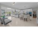 Bright kitchen with granite counters, stainless appliances, and island seating at 4600 Scottland Dr, Mebane, NC 27302
