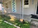 Front porch detail with decorative railing at 709 W Horne St, Clayton, NC 27520