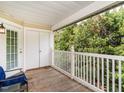Private balcony offering tranquil wooded views and ample space for relaxation at 2227 Delaney Dr # 313, Burlington, NC 27215