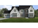 Beautiful two-story home featuring stone veneer, dark trim, and a manicured front lawn at 7000 North Ridge Dr, Raleigh, NC 27615