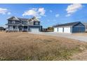 Spacious home boasts an additional large garage, providing ample parking and storage at 5554 Lake Vista Ct, Rocky Mount, NC 27803