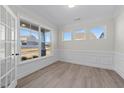 Bright office with hardwood floors, wainscoting, and large windows at 1019 Gibson House Dr, Burlington, NC 27215