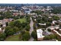 Picturesque aerial view of the Raleigh skyline with treetop views at 1001 Hillsborough St # 304, Raleigh, NC 27603