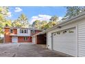 Spacious garage with ample parking and an attached carport at 3615 Octavia St, Raleigh, NC 27606