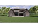 The rear exterior of the home has a covered porch, showcasing a modern design, landscaping, and ample natural light at 504 Colvard Woods Way Way, Durham, NC 27713