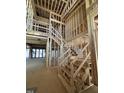 A wooden staircase is being built to the second floor and the skeleton of the frame is taking shape at 504 Colvard Woods Way Way, Durham, NC 27713
