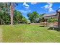 Large and well-maintained backyard with lush green grass and a wooded perimeter, ready for outdoor activities at 6965 Us-401, Fuquay Varina, NC 27526