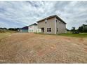 Exterior view of newly constructed homes with open backyards and space for customization at 320 Bishop Ln, Sanford, NC 27330
