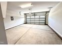 Spacious garage with an automatic door opener and plenty of room for parking and storage at 214 Drayton Hall Ln, Sanford, NC 27330