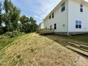 A spacious backyard with newly installed sod, offering plenty of room for outdoor activities at 335 Bishop Ln, Sanford, NC 27330