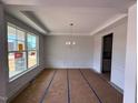 Dining area with large windows and decorative molding showcasing the space at 111 Demascus Way # 021, Four Oaks, NC 27524