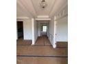 Bright entryway with white trim and neutral walls leading into the home at 111 Demascus Way # 021, Four Oaks, NC 27524