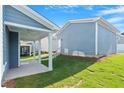 Enjoy the outdoors on this lovely home with a cozy covered patio and well-maintained green backyard at 9216 Leaning Post Rd # 447, Wake Forest, NC 27587