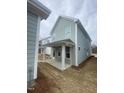 Light green home featuring a covered patio, with white columns offering an inviting outdoor space at 9212 Leaning Post Rd # 448, Wake Forest, NC 27587