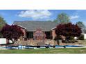 Inviting backyard featuring a pool, patio, and lush landscaping, perfect for outdoor relaxation at 166 Weldon Dr, Clayton, NC 27520