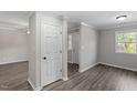 Dining area with hardwood floors and access to exterior at 501 Kendall Dr, Durham, NC 27703