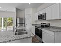 Modern kitchen with stainless steel appliances and granite countertops at 434 Glover Pk Mem Dr, Nashville, NC 27856