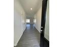 Inviting entryway with wood-look flooring that flows seamlessly into the living spaces at 180 Deodora Ln, Cameron, NC 28326