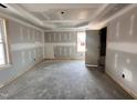 Unfinished bedroom with new windows and neutral walls at 31 Silver Ct, Smithfield, NC 27577