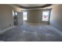 Spacious main bedroom with two windows and an ensuite bathroom at 47 Silver Ct, Smithfield, NC 27577