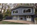 Gray house back with patio, storage shed and large windows at 2600 Wade Ave, Raleigh, NC 27607