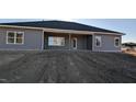 Newly constructed home with a covered patio and spacious backyard at 662 Sweet Potato Lane Ln # 35, Nashville, NC 27856