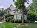 Charming home featuring stone accents, a lush lawn, and inviting curb appeal in a desirable neighborhood at 2012 Silverleaf Dr, Youngsville, NC 27596