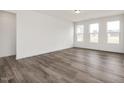 Spacious living room with hardwood floors and lots of natural light at 432 Old Fashioned Way, Lillington, NC 27546