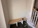 Cozy mud room with built-in bench and storage, perfect for organizing your entryway at 103 Roma Gora Ct, Princeton, NC 27569