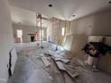 Spacious living area under construction features a fireplace, windows, and drywall at 106 Roma Gora Ct, Princeton, NC 27569