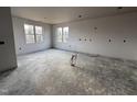 New unfurnished bedroom with large windows and concrete flooring at 141 Ruskin Dr, Smithfield, NC 27577