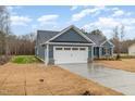 Inviting single-story home with a two-car garage and well-maintained yard at 613 Tuscany Cir, Princeton, NC 27569