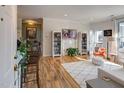 Open living room with hardwood floors, fireplace, and bright windows offering a welcoming and airy atmosphere at 710 N Person St # 304, Raleigh, NC 27604