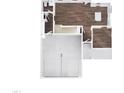Open-concept first floor layout with a kitchen, living area, bathroom, and outdoor patio at 115 Tupelo Dr, Spring Hope, NC 27882